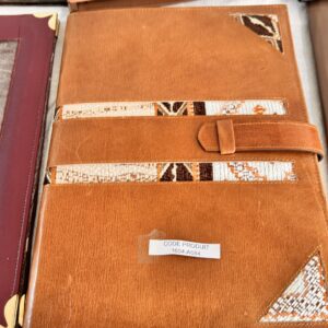 Leather briefcase with Berber fabric.
