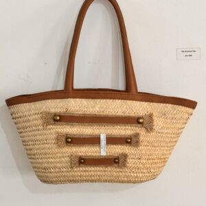Natural basket with three decorative leather straps.