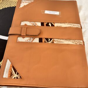 Leather document holder with traditional woven band.