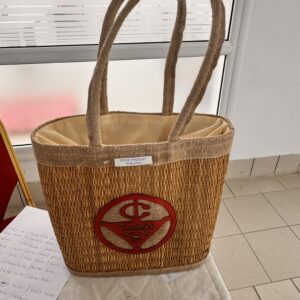Natural fiber bag with "Tunisia" logo in red.
