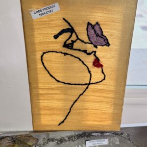 Embroidered picture of a butterfly woman