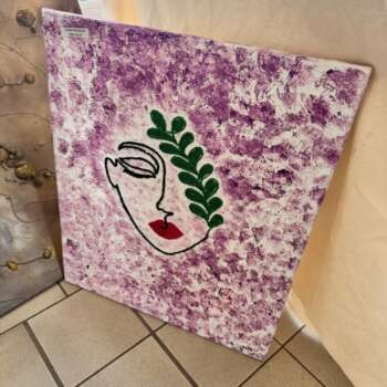 Toile « Visage au feuillage »