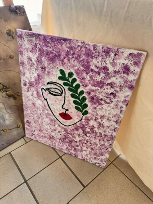 Toile « Visage au feuillage »
