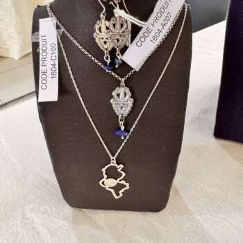 Collier oriental en argent à pendentif poisson et boucles