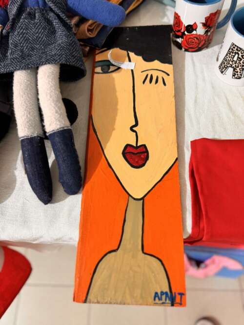 Tableau sur bois peint « Visage stylisé »