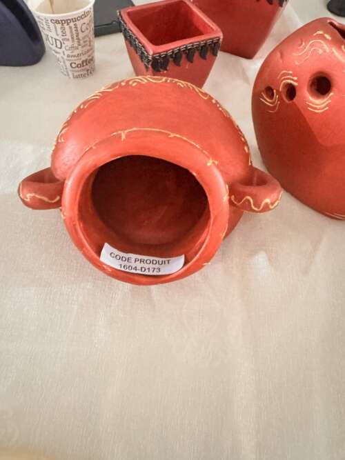 Cache-pot en céramique orange à liseré doré