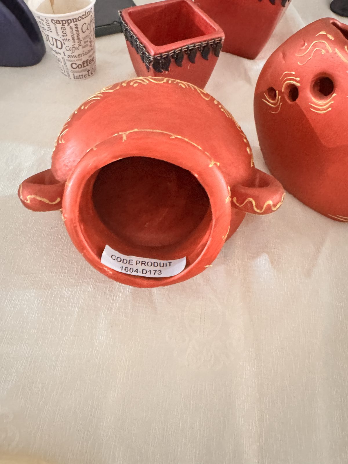 Cache-pot en céramique orange à liseré doré